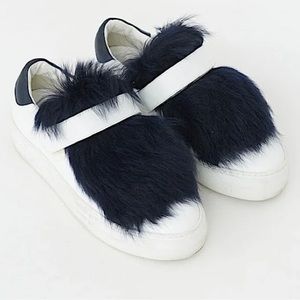 Moncler leather sneakers with navy fur and Velcro strap. Size 39